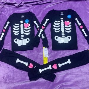 ONE set of Carter’s glow in the dark pajamas